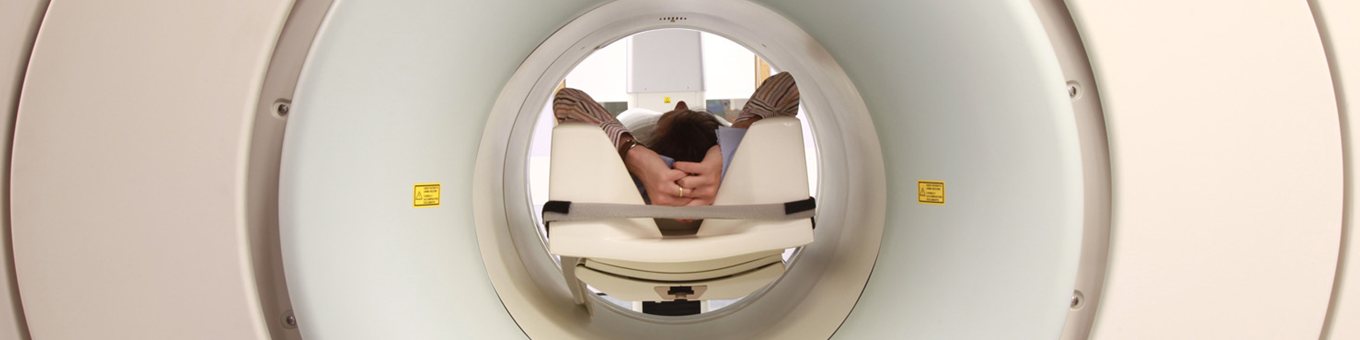 someone lying in an MRI scanner