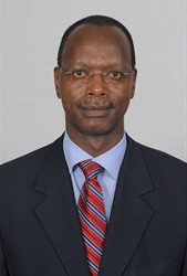 Isaac Macharia head and shoulders photo wearing a suit