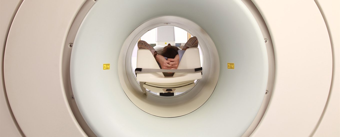 Someone inside an MRI scanner