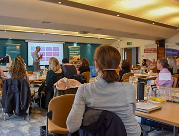 A group of people listening to a talk at the BSMS Research Culture day 2024