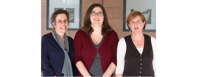 Bobbie, Muna, and Sue standing in a group