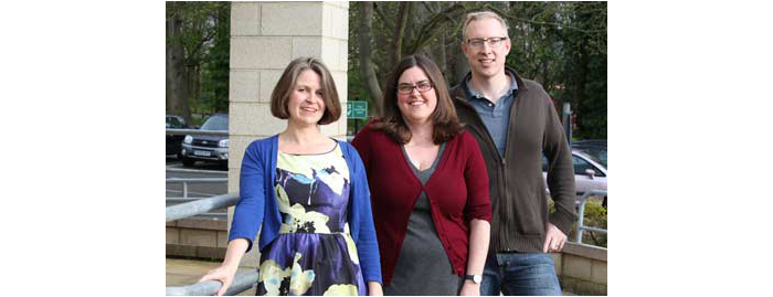 A group photo from Graphic Medicine: showing Nicola, Muna, and Aneurin standing in a group.