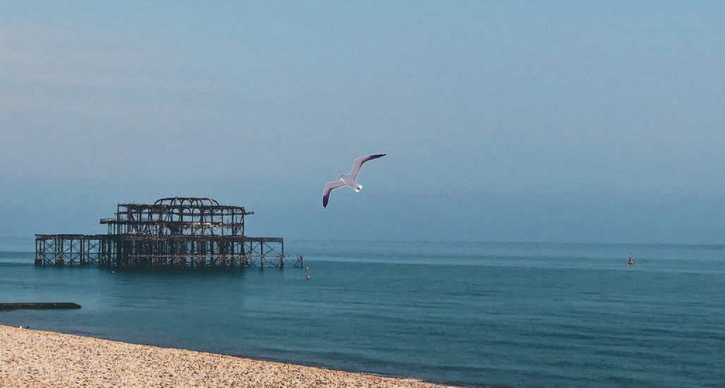 The west pier and beach in Brighton