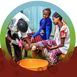 A photo showing two patients receiving treatment for podoconiosis in Ethiopia