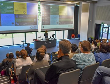 A group of people in the audience at the Sussex Clinical Academic Conference 2024