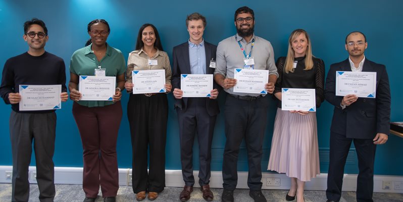 The 2025 LEFs holding up certificates and smiling at the fellowship celebration event