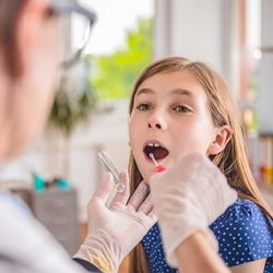 a patient receiving a swab test