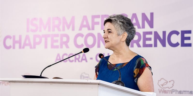 Iris Asllani of BSMS talking at a lecturn