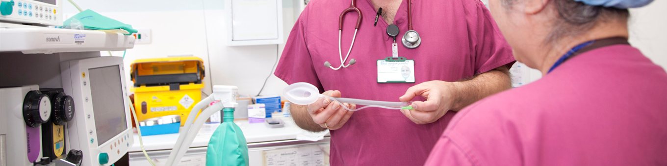 Anaesthesia - man holding surgical equipment