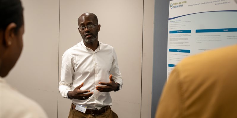 LEF students at BSMS presenting posters to a group