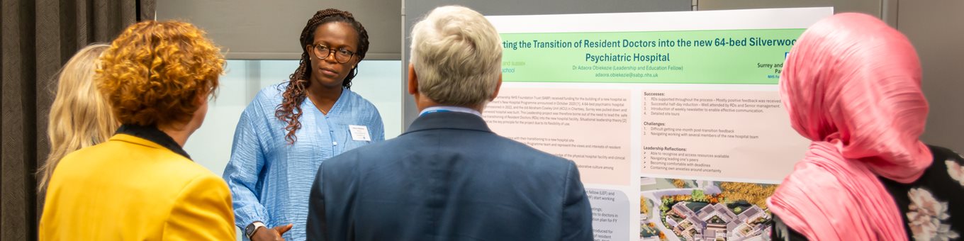 LEF students at BSMS presenting posters to a group