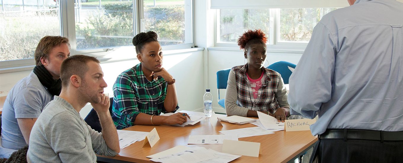 Students sitting around a table