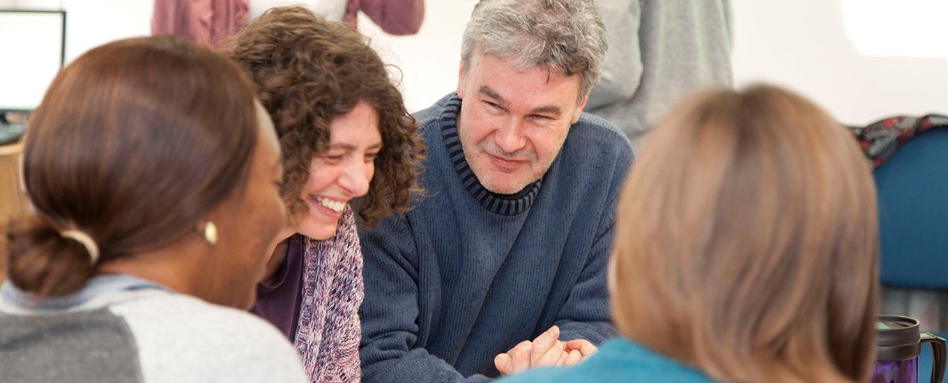 Dementia students at a Dementia support group with 3 people sitting in a circle