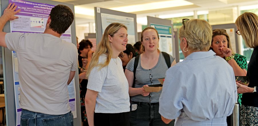 People standing around talking and socialising