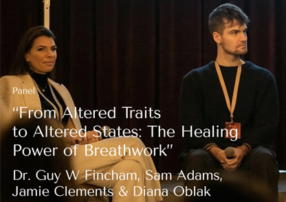 Two people sat on stage at a conference giving a panel discussion with the title of the talk 'From Altered Traits to Altered States: The Healing Power of Breathwork' written on the image
