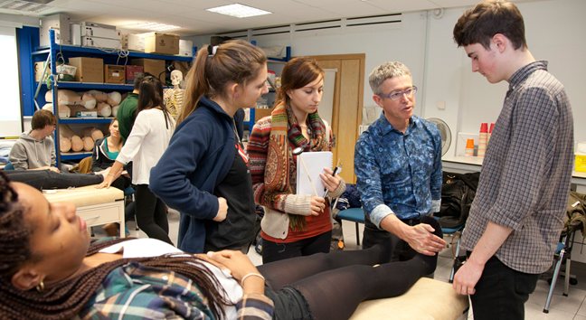 Students and teacher in a clinical skills tutorial