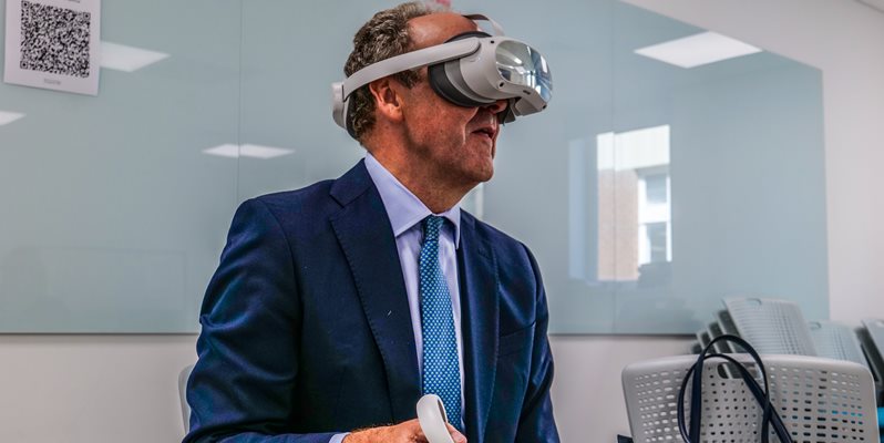 The Lord Lieutenant of East Sussex with a VR headset on during a visit to the BSMS Anatomy Suite