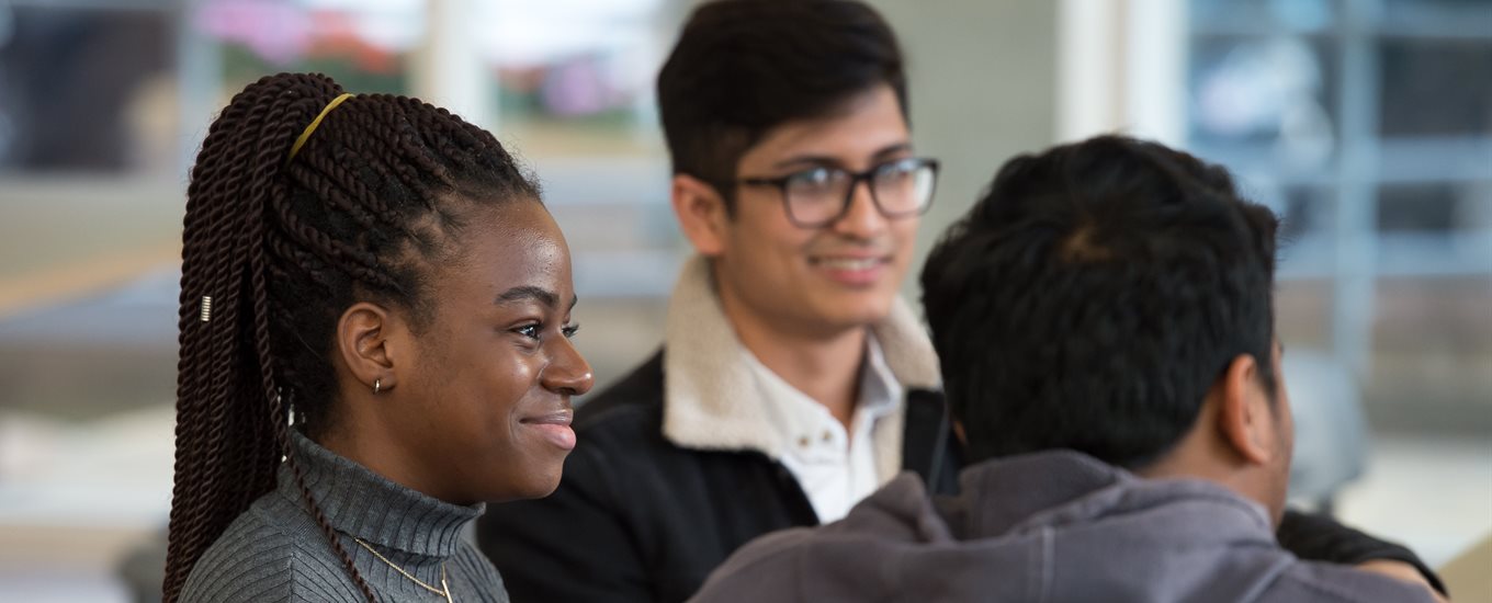 Three students in the cafe