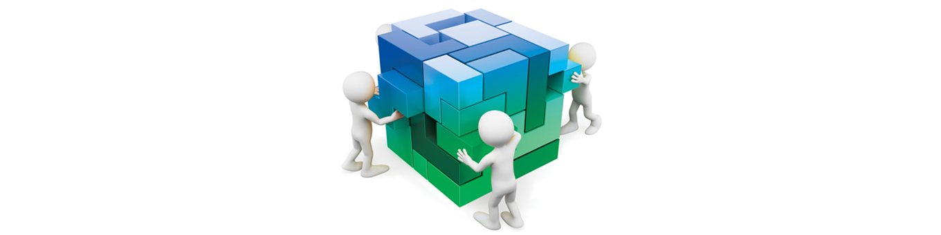 Graphic showing a green and blue cube with different shaped pieces fitting together, with 3 simplified figures standing at each face, helping to put it together