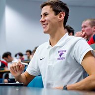 Student in class, smiling