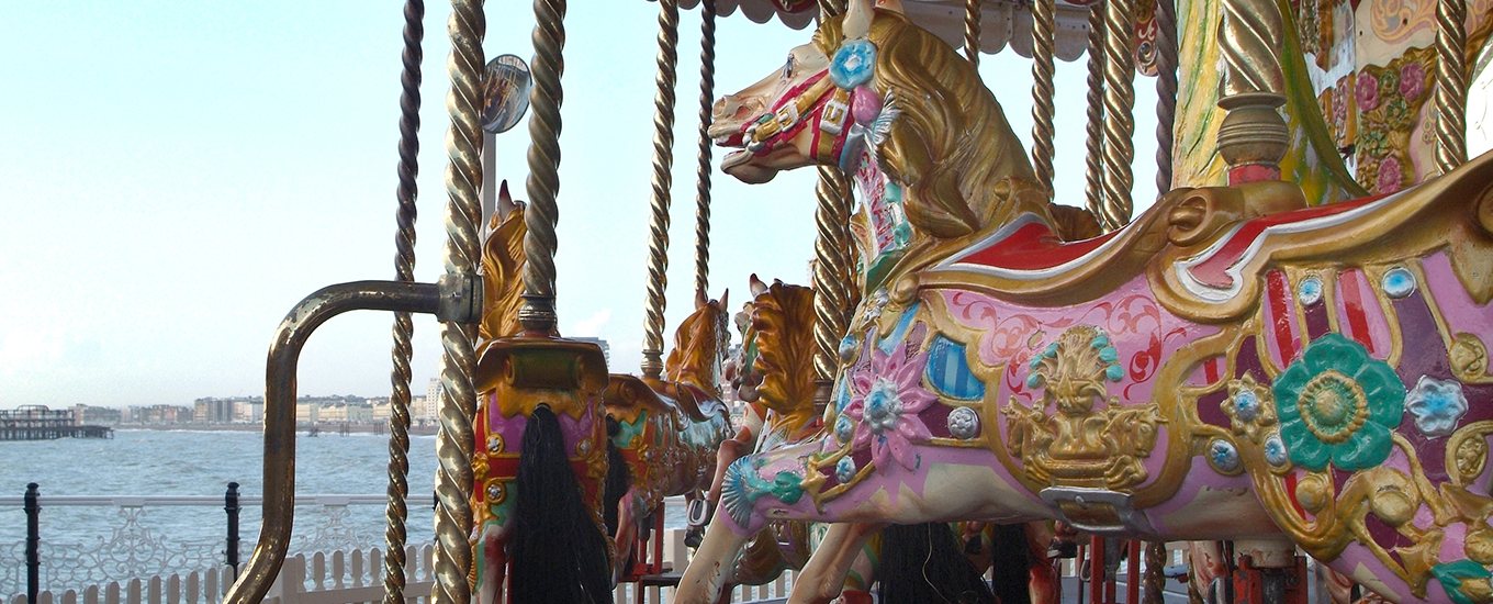 The carousel at Brighton beach, with a view towards the West Pier