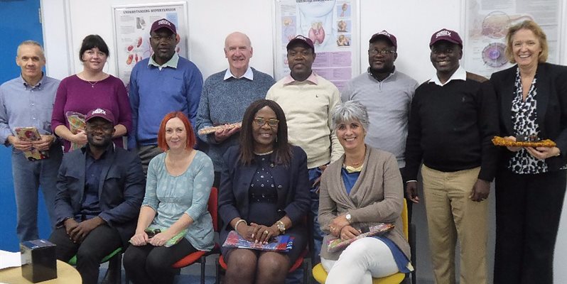 A group of people working in pharmacy and related fields in a group photo