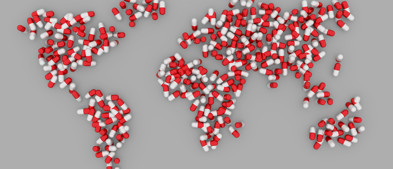 Illustrated map of the world made up from red and white pills