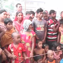 A group photograph from a Bangladesh community theatre