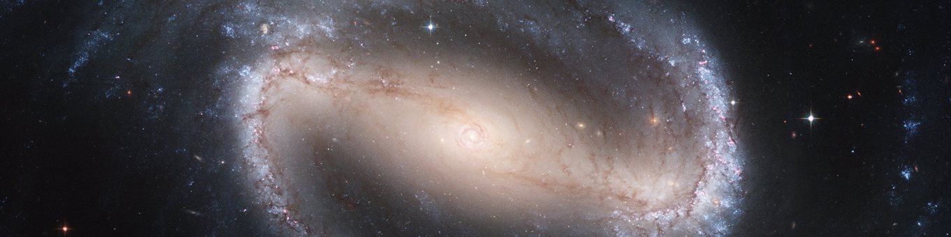 Telescopic image of a large orange and blue galaxy