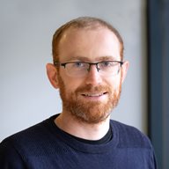 A head and shoulders photo of Dr Chris Jones