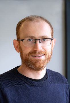 A head and shoulders photo of Dr Chris Jones