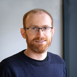 A head and shoulders photo of Dr Chris Jones