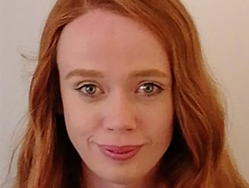 A head and shoulders image of Dr Daisy Woolham