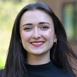 A head and shoulders photo of Emily Budden