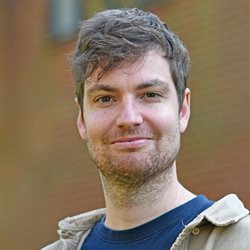 A head and shoulders photo of Guy Fincham