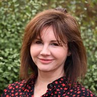 A head and shoulders image of Jane Green MBE
