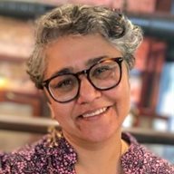 A head and shoulders photo of Kanwal Mand