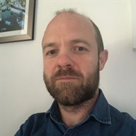 A head and shoulders photo of Luke Hodgson