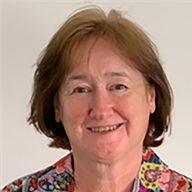 A head and shoulders image of Nicola Schmidt-Renfree wearing a floral blazer