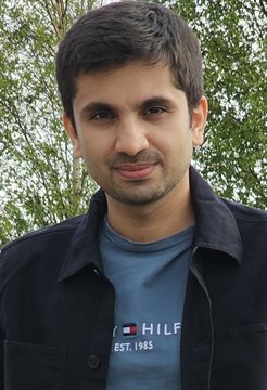 A head and shoulders photo of Yamma Khalid Aria