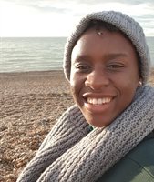 Awa Tansie pictured on Brighton beach in the winter