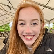 Olivia Tolson pictured outside under a canopy smiling