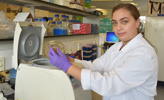 Trisha Hughes working in lab