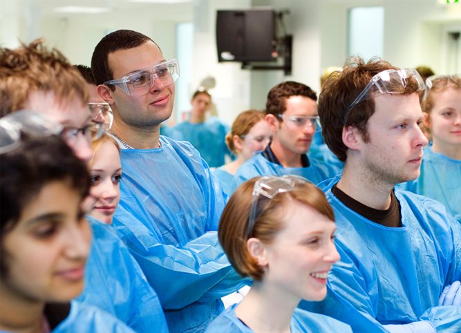 smiling male in scrubs